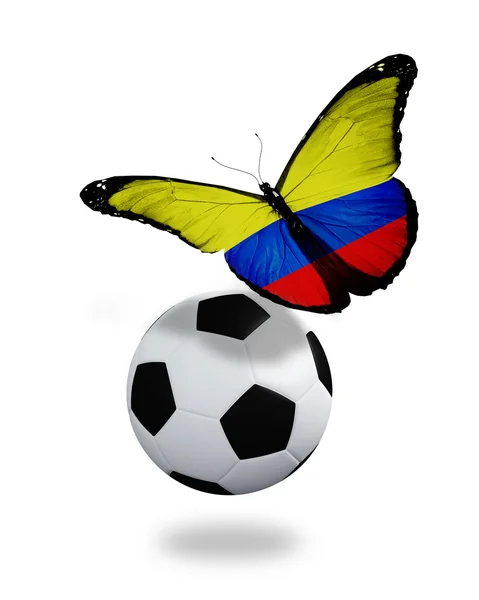 stock image Concept - butterfly with Colombian flag flying near the ball, li