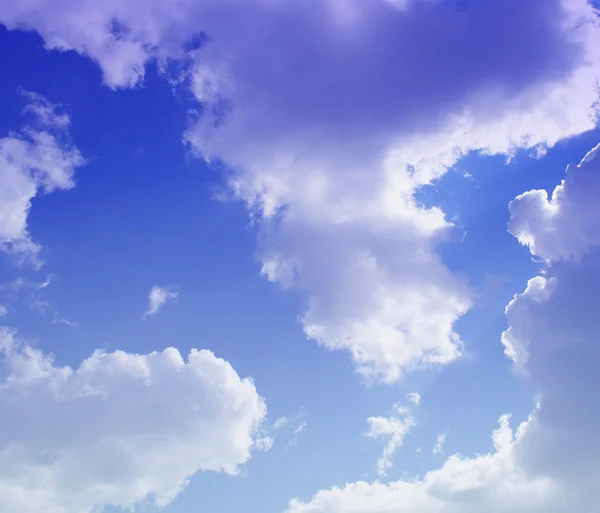 The blue sky with clouds, background — Stock Photo, Image