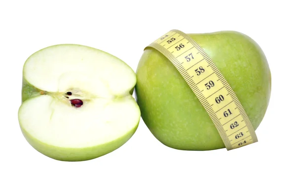 Maßband und grüner Apfel — Stockfoto