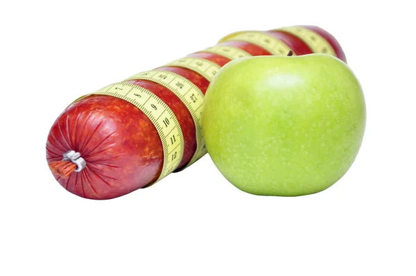 Wurst und grüner Apfel — Stockfoto