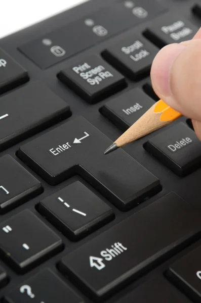 Computertastatur und Bleistift — Stockfoto