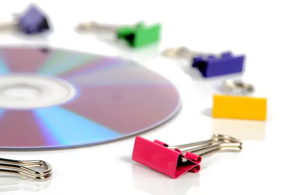 Paper clips and DVD — Stock Photo, Image