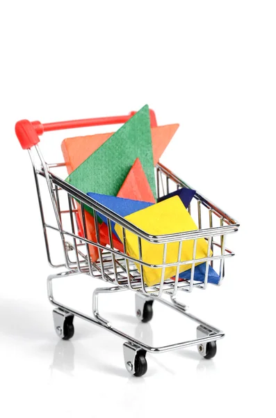 Koszyk na zakupy i chiński tangram — Zdjęcie stockowe