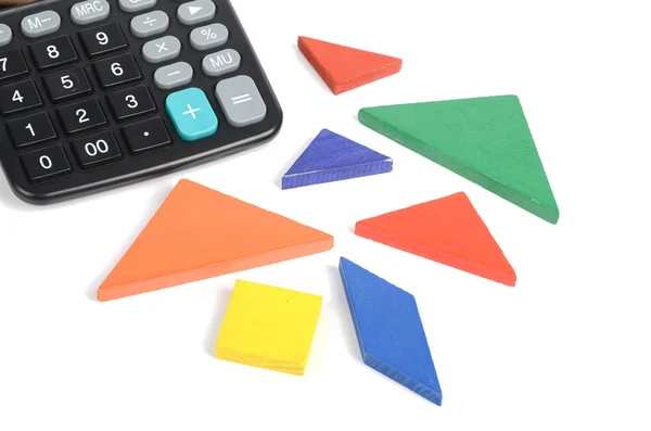 Chinese tangram and calculator — Stock Photo, Image