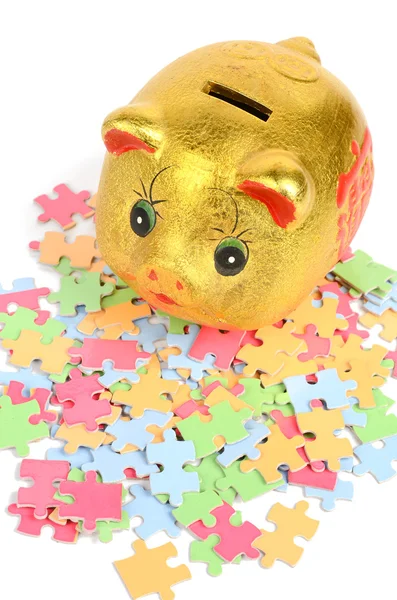 Puzzle i piggy bank — Zdjęcie stockowe