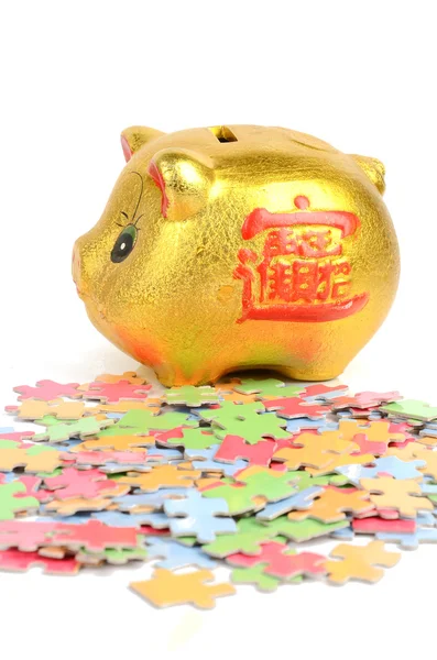 Puzzle i piggy bank — Zdjęcie stockowe