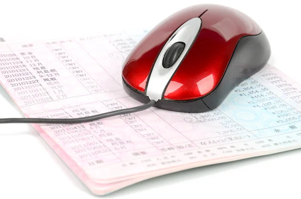 Computer mouse and passbook — Stock Photo, Image
