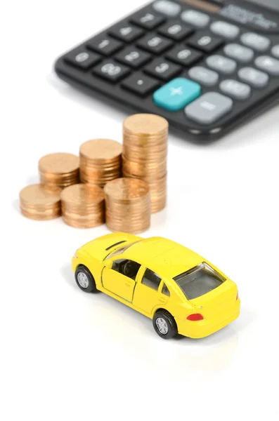 Toy car and calculator with coin — Stock Photo, Image