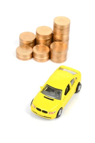 Toy car and coin — Stock Photo, Image
