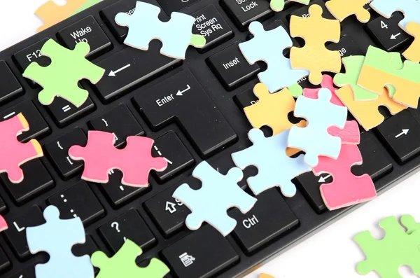 Klávesnice a puzzle — Stock fotografie