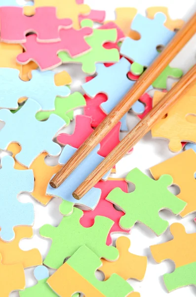 Puzzle and chopstick — Stock Photo, Image