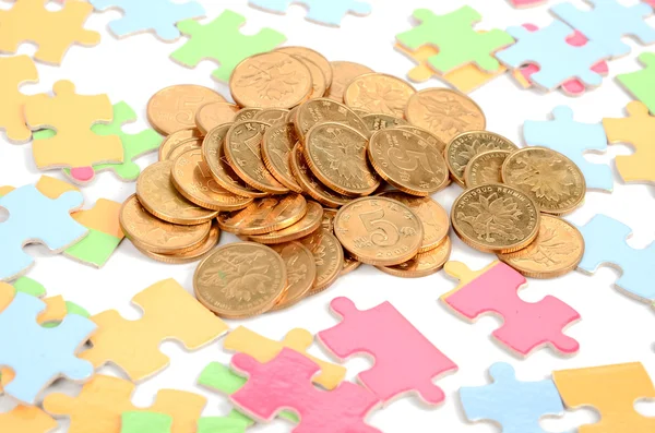 Puzzle and coin — Stock Photo, Image