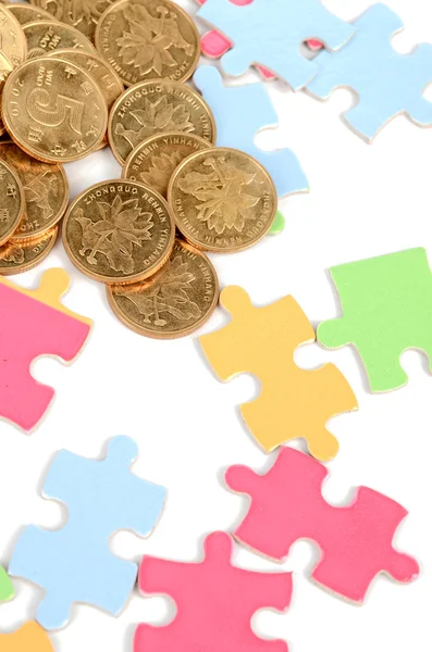 Puzzle and coin — Stock Photo, Image