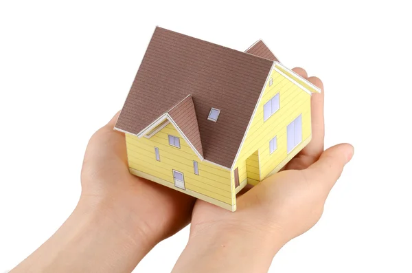 Modelo de casa en mano — Foto de Stock