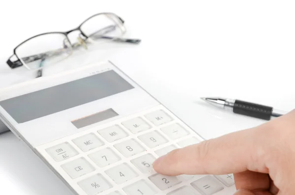 Calculadora e caneta com óculos — Fotografia de Stock