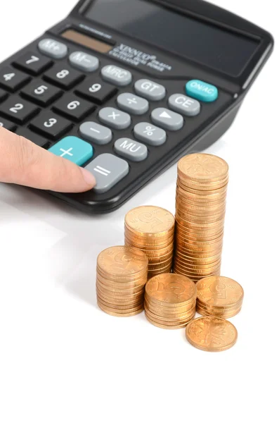 Kalkulator i monety — Zdjęcie stockowe