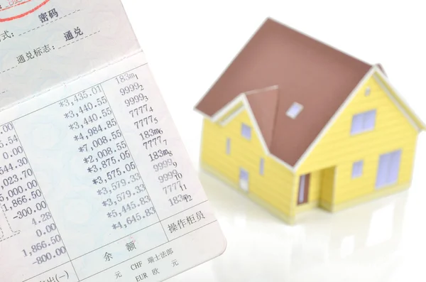 stock image Model house and bankbook