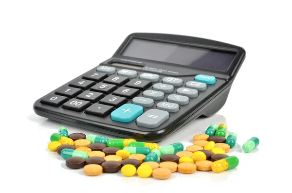Medicine and calculator — Stock Photo, Image