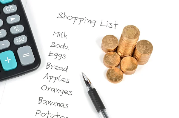 Het winkelen lijst en munt — Stockfoto