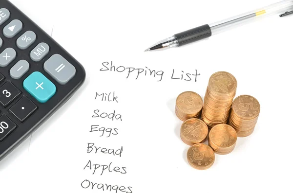 Shopping list and coin — Stock Photo, Image