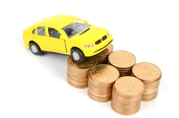 Toy car and coin — Stock Photo, Image