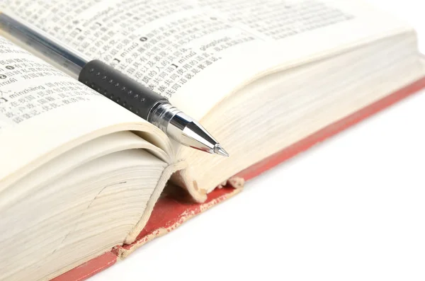 Penna e dizionario — Foto Stock