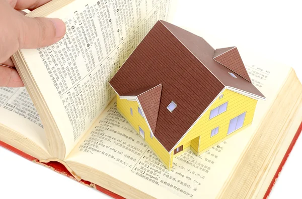 Model house and dictionary — Stock Photo, Image