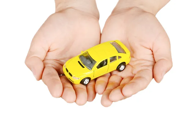 Leksak bil i hand — Stockfoto
