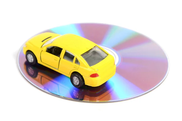 DVD e carro de brinquedo — Fotografia de Stock
