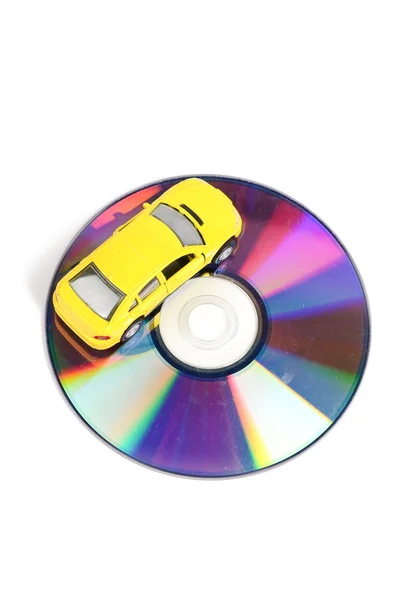 DVD и игрушечный автомобиль — стоковое фото