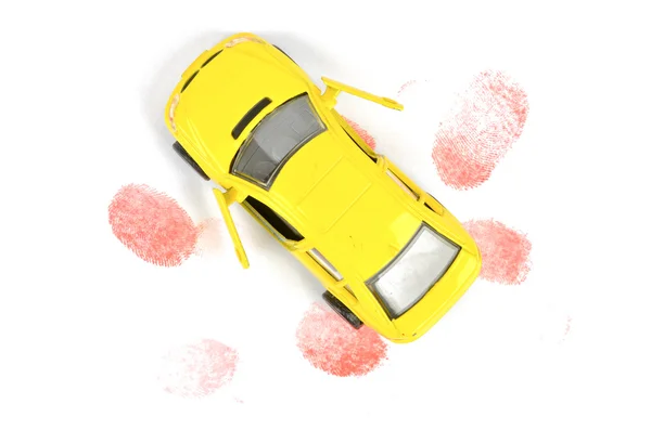 Oyuncak araba ve parmak baskı — Stok fotoğraf