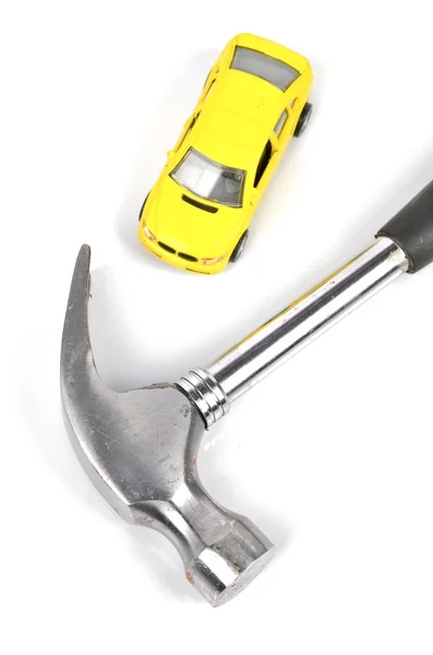 Hammer and toy car — Stock Photo, Image