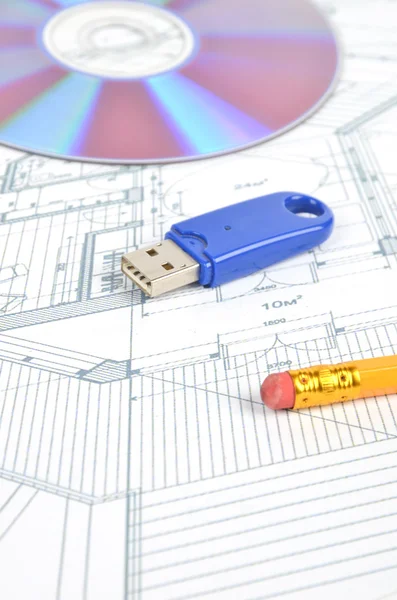 USB disk and DVD with blueprint — Stock Photo, Image