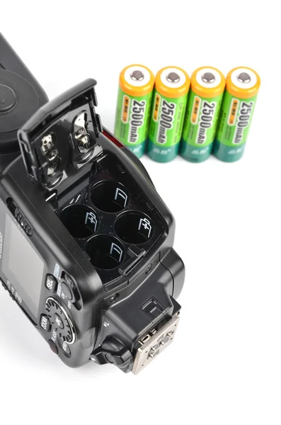 Lâmpada flash e bateria — Fotografia de Stock