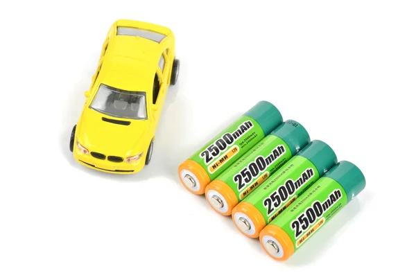 Baterías y coche de juguete — Stockfoto