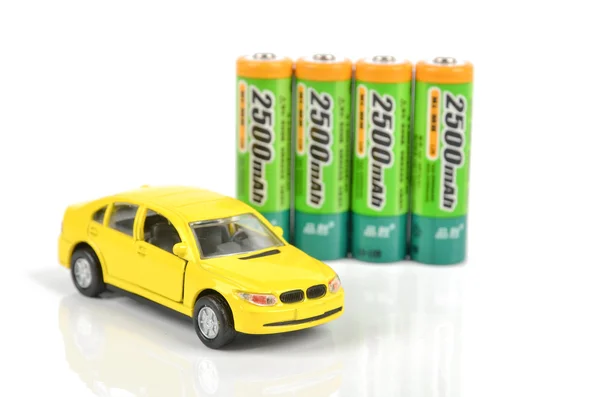 Baterias e carro de brinquedo — Fotografia de Stock