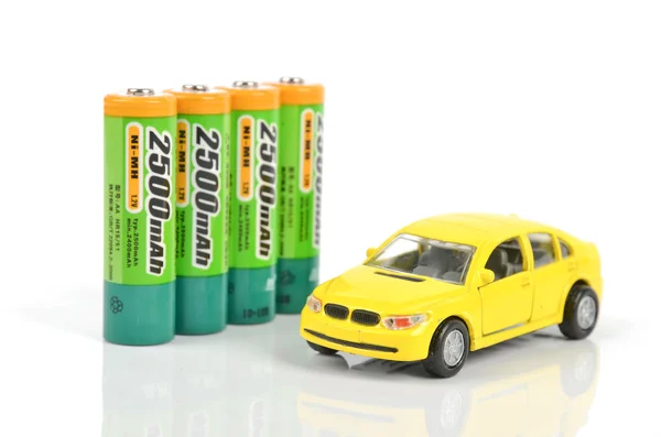 Baterias e carro de brinquedo — Fotografia de Stock