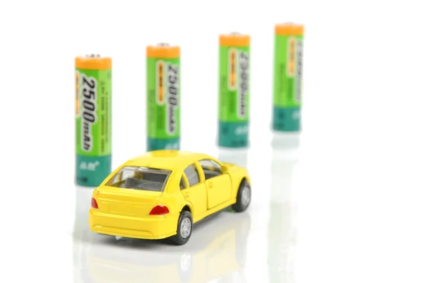Batteries and toy car — Stock Photo, Image