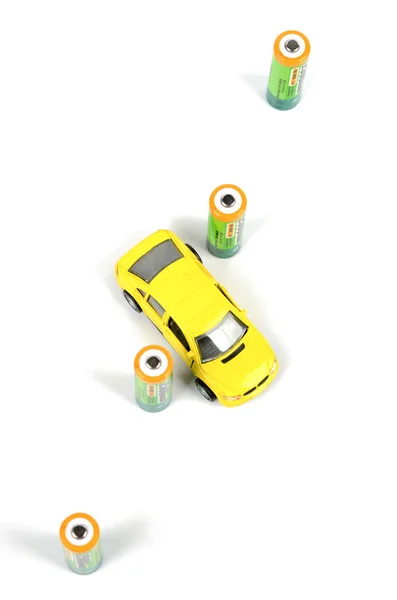 Baterías y coche de juguete — Foto de Stock