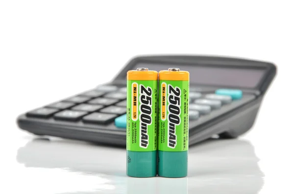 Baterias e calculadora — Fotografia de Stock