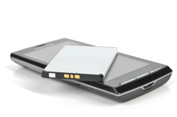 Inteligentny telefon i bateria — Zdjęcie stockowe