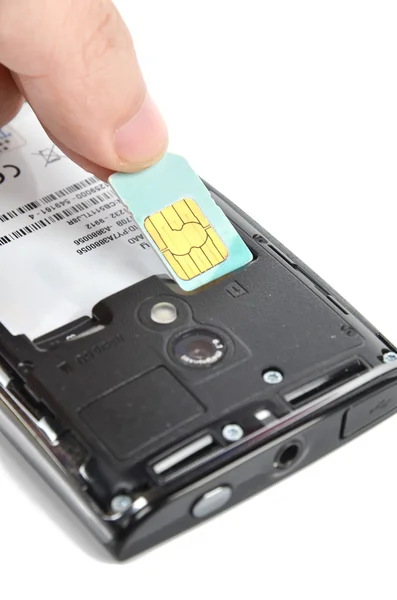 Telefon inteligent și card SIM — Fotografie, imagine de stoc