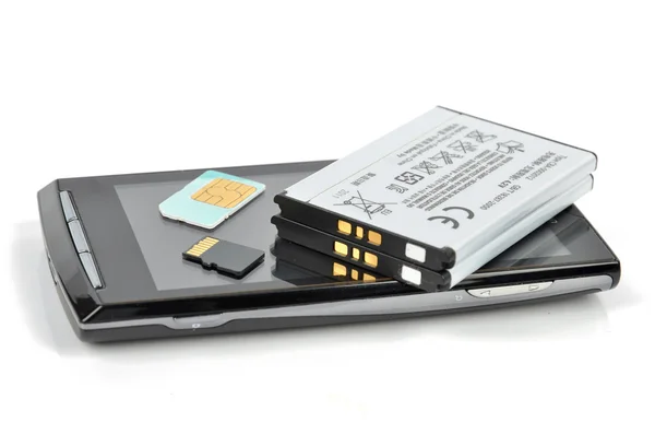 Telefone inteligente e cartão SIM — Fotografia de Stock