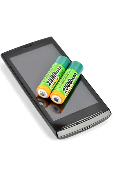 Bateria e telefone inteligente — Fotografia de Stock