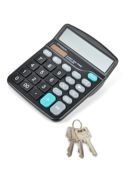 Калькулятор и ключ — стоковое фото