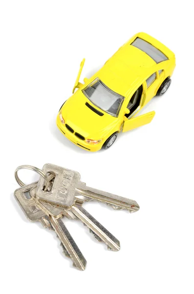 Carro de brinquedo e chave — Fotografia de Stock