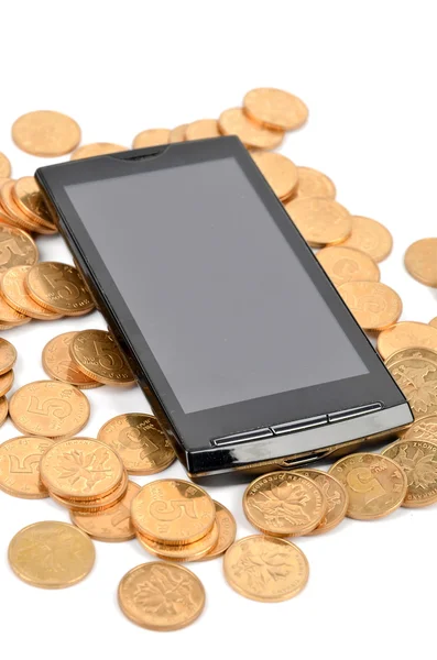Teléfono inteligente y moneda — Foto de Stock