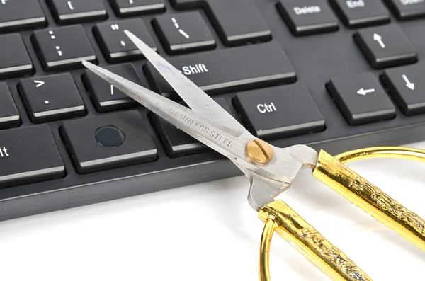 Nożyczki i rachmistrz klawiatura — Zdjęcie stockowe