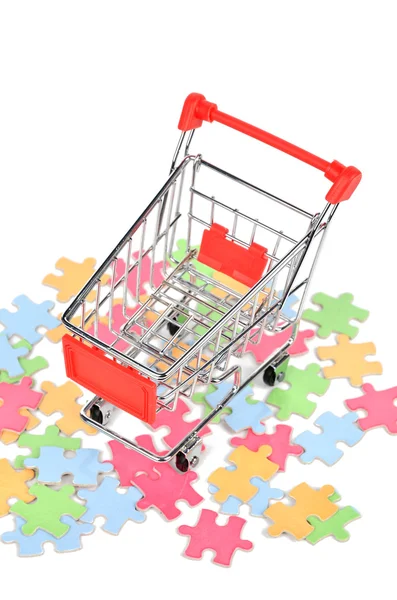 Puzzle and shopping cart — Stock Photo, Image