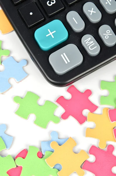 Puzzle und Taschenrechner — Stockfoto
